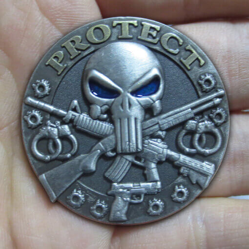 Protect Punisher Police Lapel Pin in hand